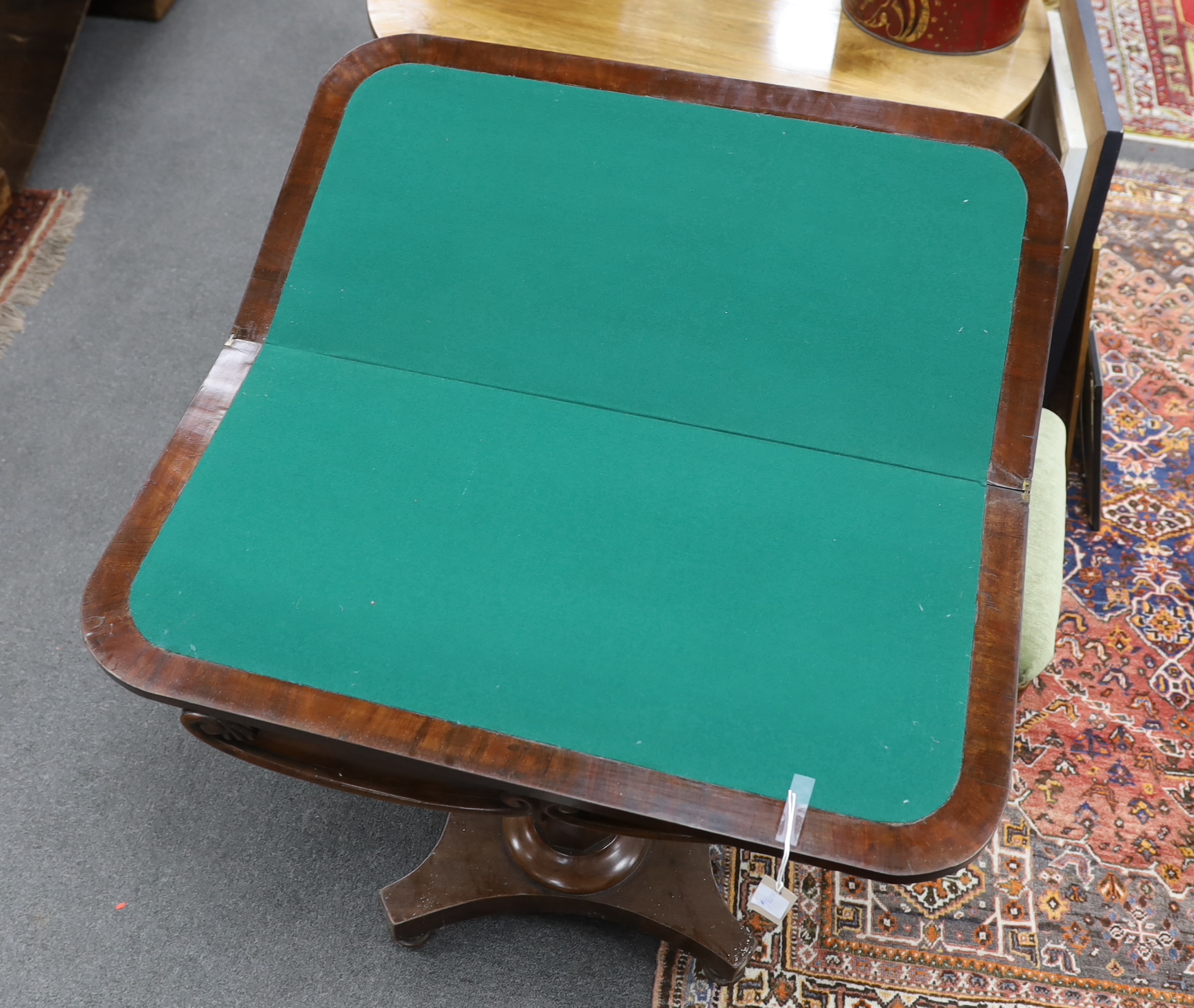 An early Victorian mahogany rectangular folding card table, width 91cm, depth 45cm, height 76cm